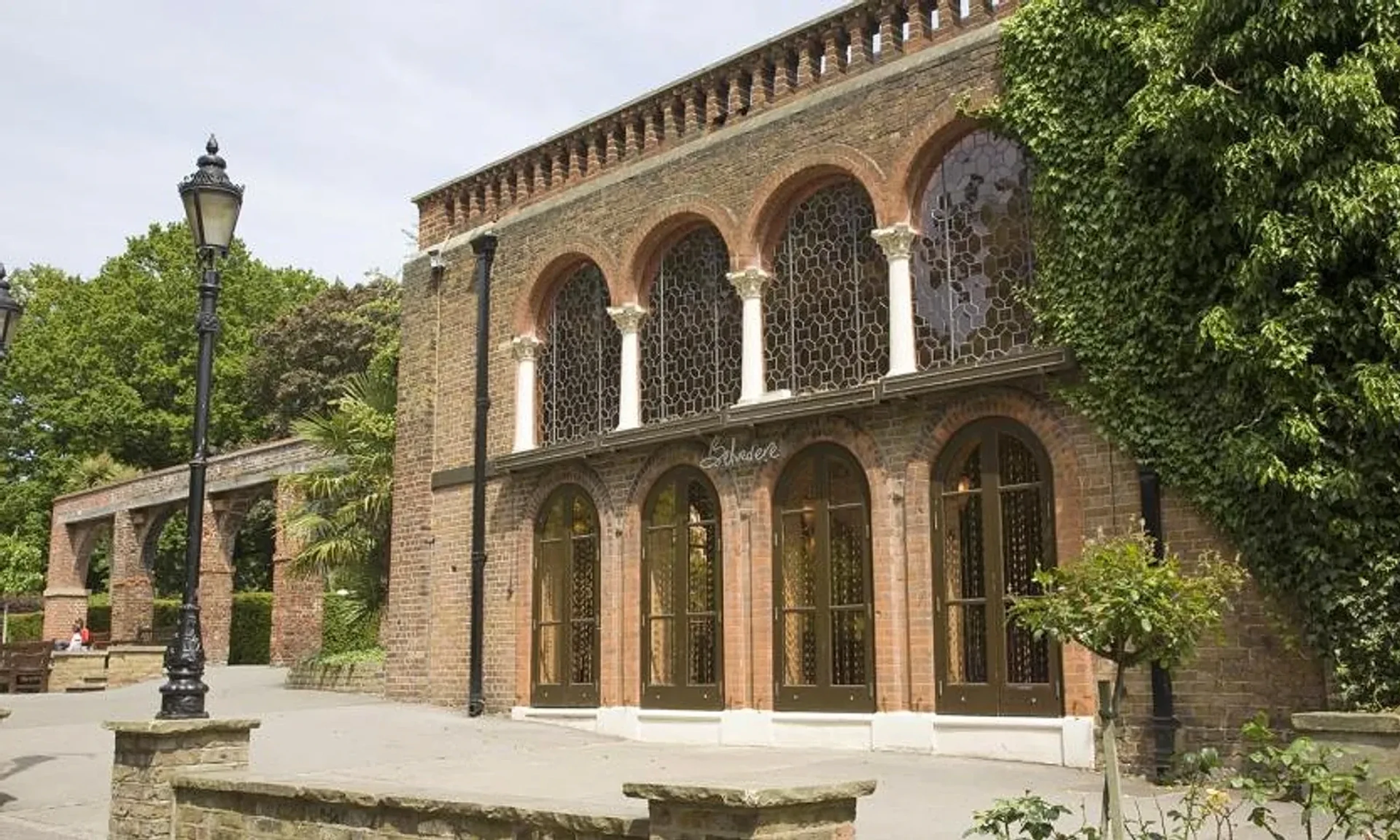 The arched pavilion surrounded by greenery in Holland Park