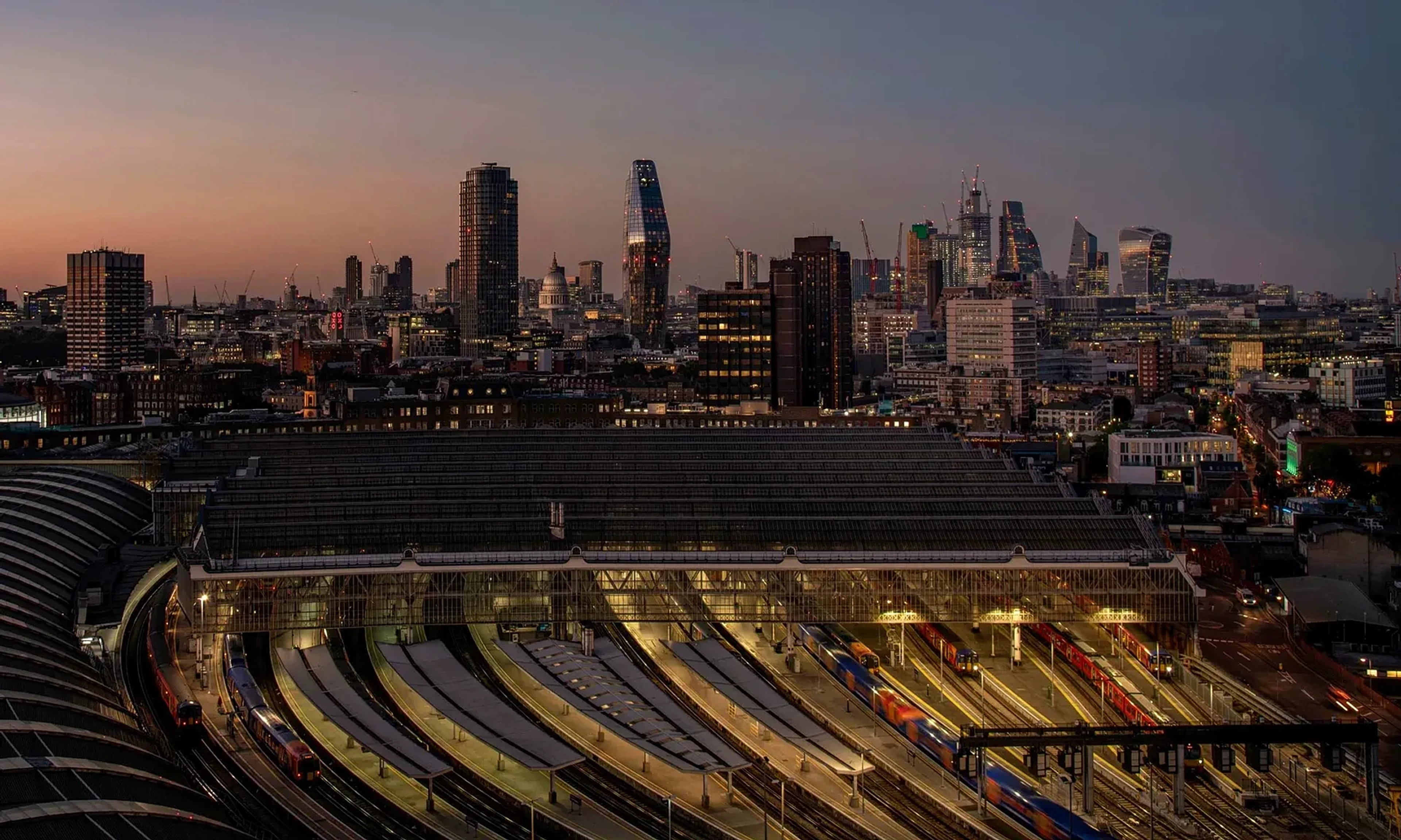Waterloo station and the London skyline at night