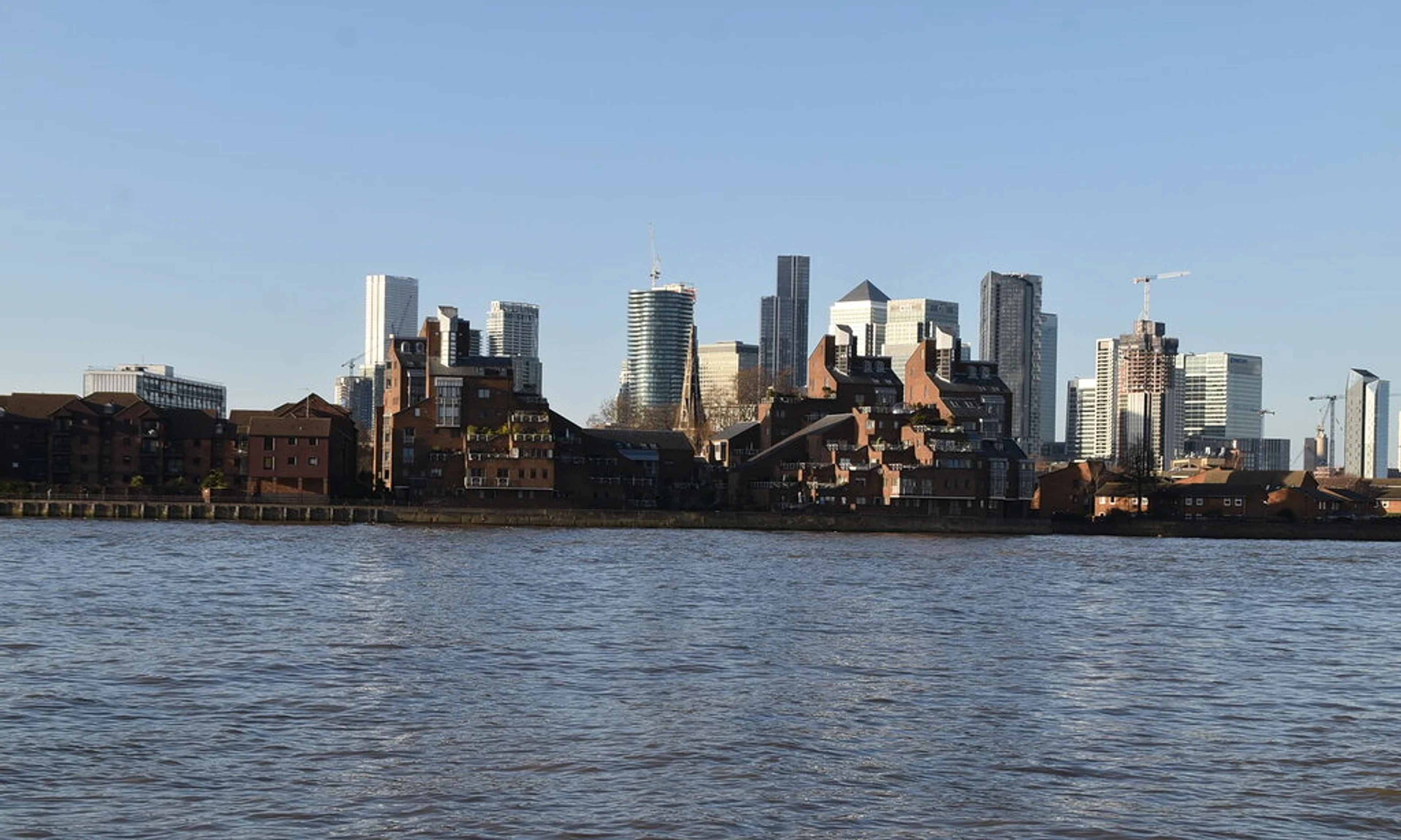 Modern Isle of Dogs skyline across the River Thames